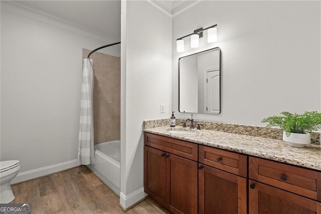 4290 Bobbins Way, Cumming, GA 30041 - full bath with ornamental molding, toilet, wood finished floors, vanity, and shower / tub combo with curtain