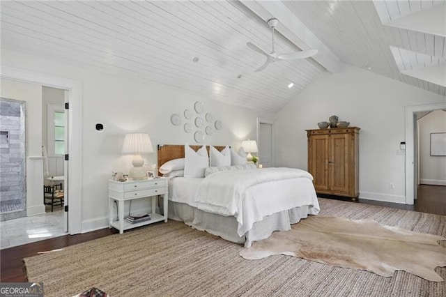820 Wilson Rd NW, Atlanta, GA 30318 - bedroom with baseboards, wood finished floors, lofted ceiling with beams, and a fireplace