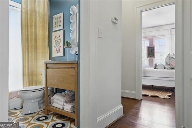 820 Wilson Rd NW, Atlanta, GA 30318 - hall with wood finished floors and baseboards