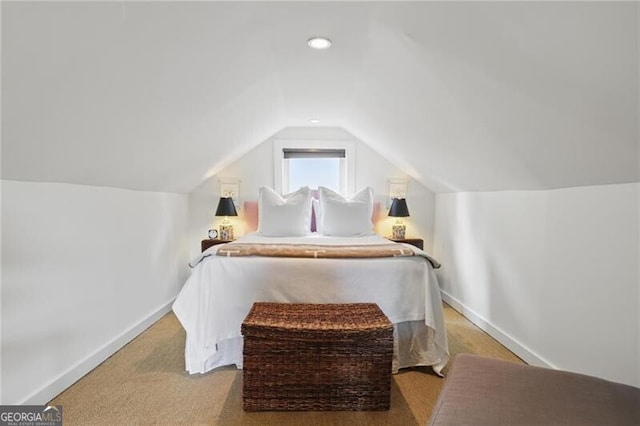 820 Wilson Rd NW, Atlanta, GA 30318 - carpeted bedroom with lofted ceiling, baseboards, and recessed lighting