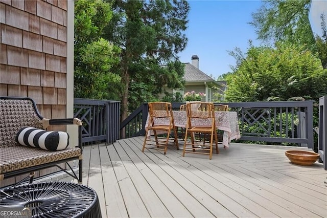 820 Wilson Rd NW, Atlanta, GA 30318 - wooden terrace featuring outdoor dining area
