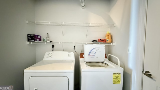 laundry area with washer and dryer