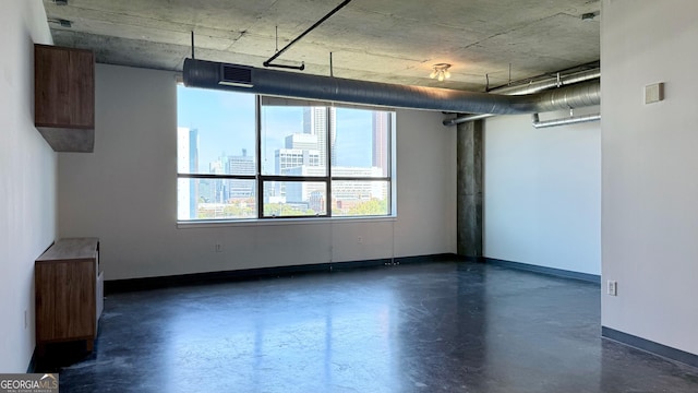 interior space with baseboards and visible vents