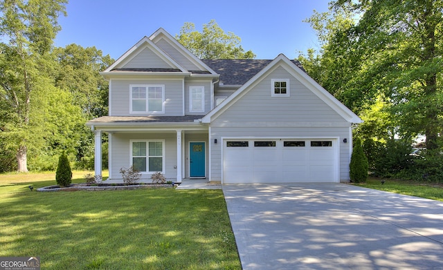 419 Mcinnes Cir SE, Marietta, GA 30060 - view of front of property with concrete driveway, a front yard, covered porch, and a shingled roof