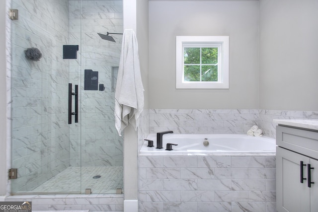 419 Mcinnes Cir SE, Marietta, GA 30060 - bathroom featuring vanity, a bath, and a stall shower