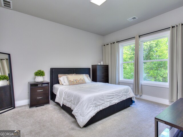 419 Mcinnes Cir SE, Marietta, GA 30060 - carpeted bedroom featuring baseboards