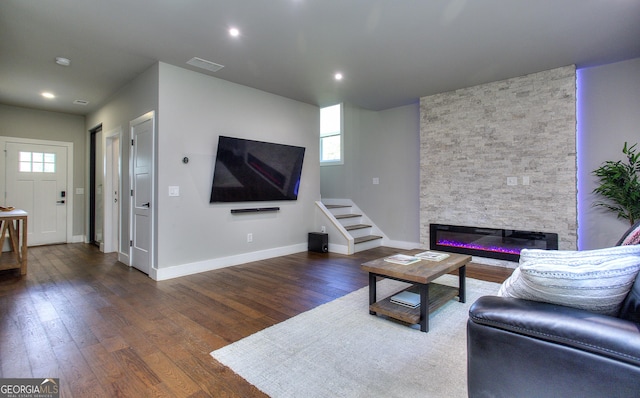 419 Mcinnes Cir SE, Marietta, GA 30060 - living room with wood finished floors, plenty of natural light, a fireplace, baseboards, and recessed lighting