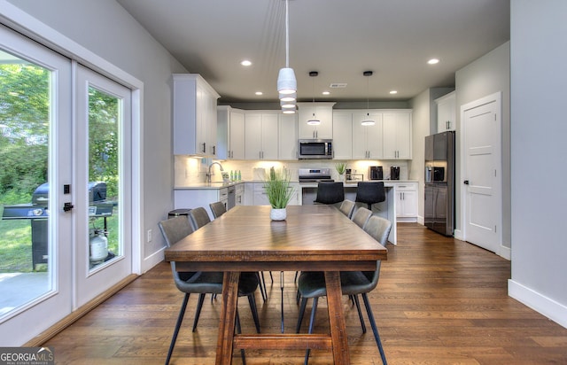 419 Mcinnes Cir SE, Marietta, GA 30060 - dining area with baseboards, recessed lighting, dark wood-style floors, and french doors