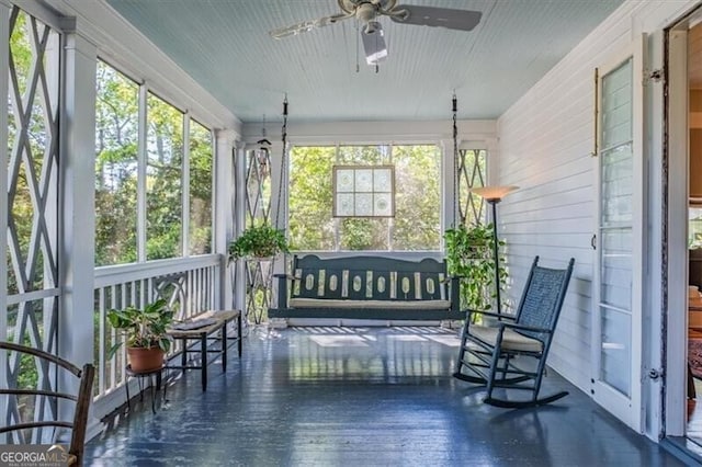 sunroom featuring hardwood / wood-style flooring