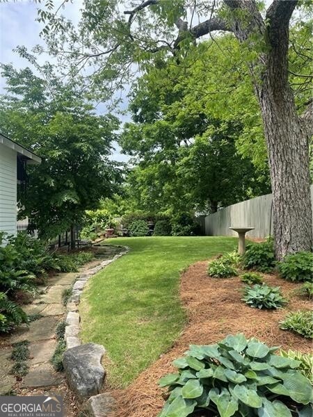 view of yard featuring fence