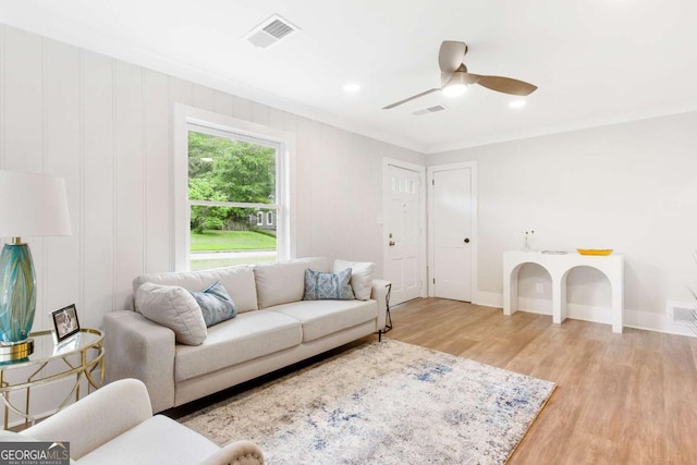 2260 Old Spring Rd SE, Smyrna, GA 30080 - living room featuring wood finished floors, a ceiling fan, crown molding, and recessed lighting