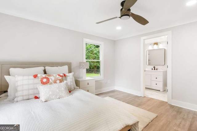 2260 Old Spring Rd SE, Smyrna, GA 30080 - bedroom featuring light wood finished floors, recessed lighting, ensuite bath, and ceiling fan