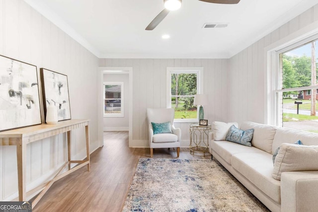 2260 Old Spring Rd SE, Smyrna, GA 30080 - living room featuring ceiling fan, wood finished floors, and ornamental molding