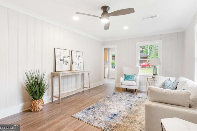 2260 Old Spring Rd SE, Smyrna, GA 30080 - living area with ceiling fan, wood finished floors, crown molding, and recessed lighting
