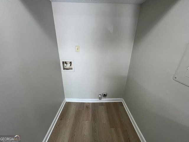 1466 Pine Log Rd NE Unit A, Conyers, GA 30012 - laundry room featuring washer hookup, dark wood finished floors, baseboards, and laundry area