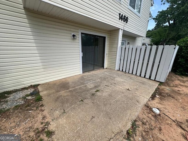 1466 Pine Log Rd NE Unit A, Conyers, GA 30012 - view of patio / terrace featuring fence