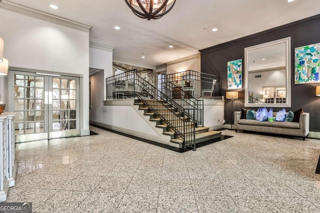 275 13th St NE Unit 605, Atlanta, GA 30309 - stairway with crown molding, recessed lighting, baseboards, french doors, and granite tiled floors