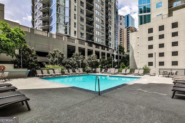 275 13th St NE Unit 605, Atlanta, GA 30309 - community pool with a patio area