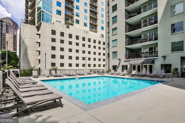 275 13th St NE Unit 605, Atlanta, GA 30309 - community pool featuring a patio area