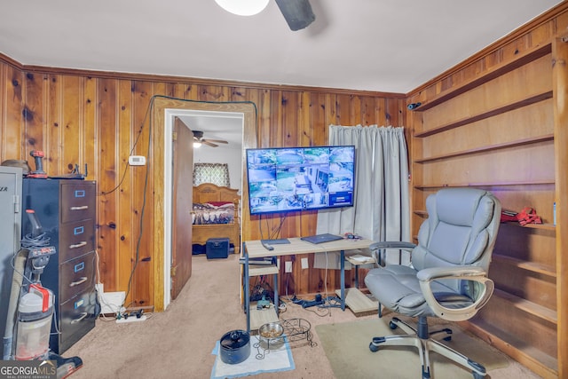 627 N Hulin Ave, Tignall, GA 30668 - carpeted home office with wood walls and a ceiling fan