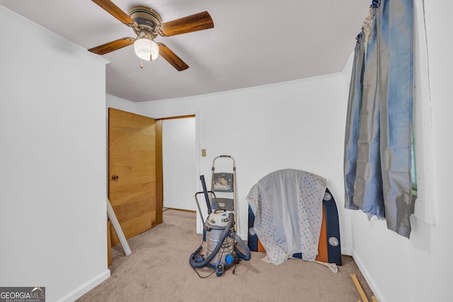 627 N Hulin Ave, Tignall, GA 30668 - interior space featuring crown molding, carpet flooring, baseboards, and a ceiling fan