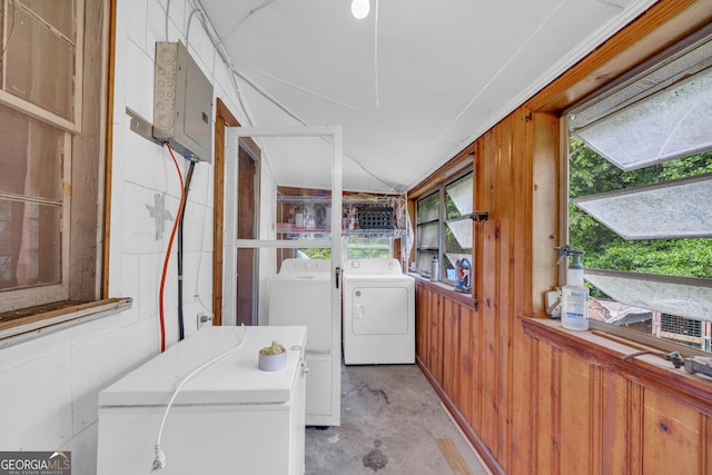 627 N Hulin Ave, Tignall, GA 30668 - laundry room with washing machine and dryer, wooden walls, and laundry area