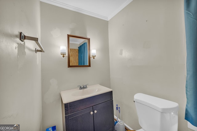 627 N Hulin Ave, Tignall, GA 30668 - half bathroom with toilet, vanity, and ornamental molding