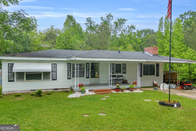627 N Hulin Ave, Tignall, GA 30668 - rear view of house with a shingled roof, a yard, a chimney, and a porch