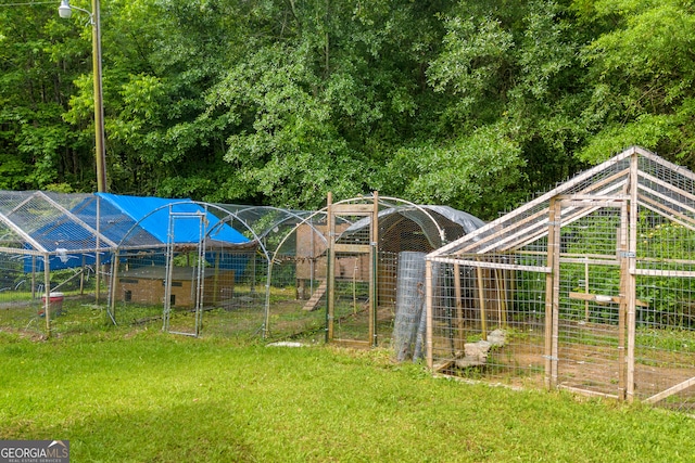 627 N Hulin Ave, Tignall, GA 30668 - view of yard with exterior structure and an outbuilding
