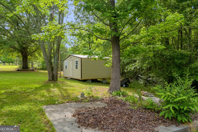 627 N Hulin Ave, Tignall, GA 30668 - view of yard with an outdoor structure and a shed