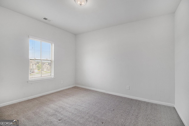 2113 Dodson Woods Dr, Fairburn, GA 30213 - carpeted empty room featuring baseboards and visible vents