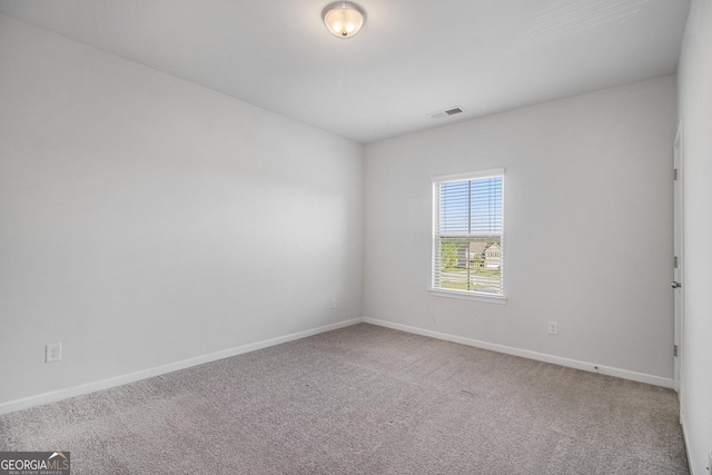 2113 Dodson Woods Dr, Fairburn, GA 30213 - carpeted empty room featuring baseboards and visible vents