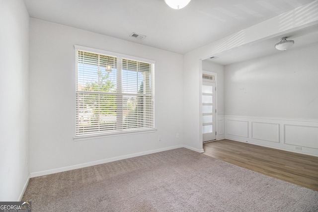 2113 Dodson Woods Dr, Fairburn, GA 30213 - unfurnished room featuring baseboards, carpet flooring, and visible vents