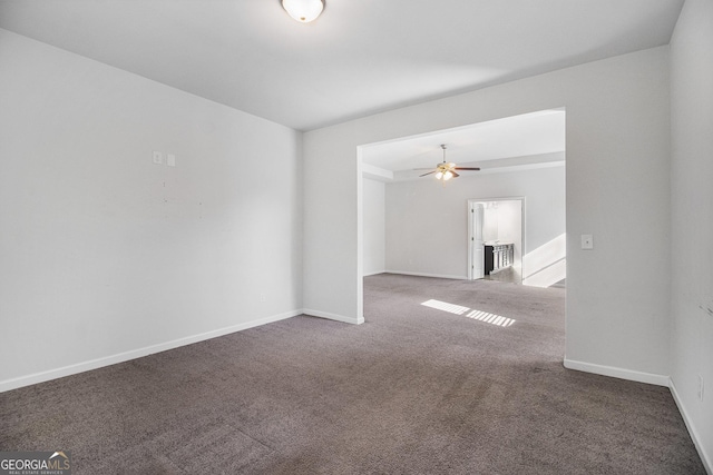 2113 Dodson Woods Dr, Fairburn, GA 30213 - carpeted spare room featuring baseboards and ceiling fan