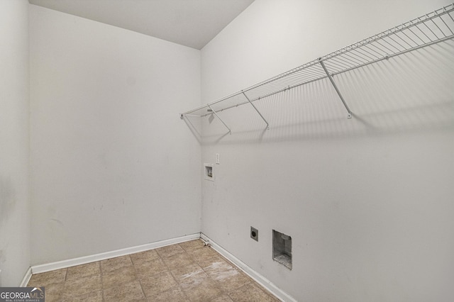 2113 Dodson Woods Dr, Fairburn, GA 30213 - clothes washing area with laundry area, electric dryer hookup, baseboards, and hookup for a washing machine