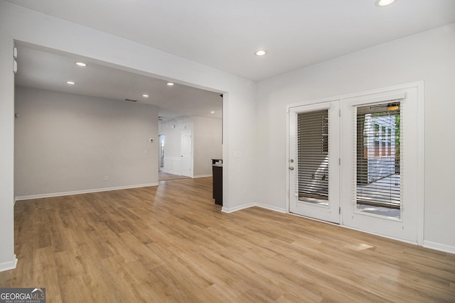 2113 Dodson Woods Dr, Fairburn, GA 30213 - empty room featuring light wood finished floors, baseboards, and recessed lighting