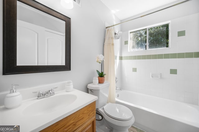 bathroom with toilet, shower / tub combo, visible vents, and vanity