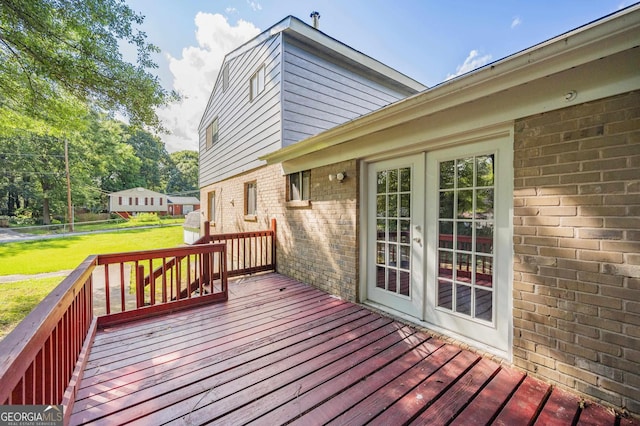 deck featuring a yard