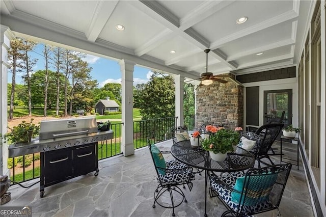 view of patio featuring ceiling fan and outdoor dining area