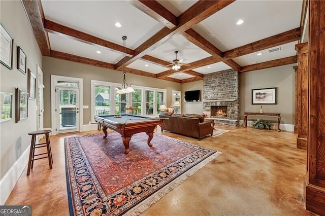 game room with coffered ceiling, beamed ceiling, ceiling fan, a large fireplace, and pool table