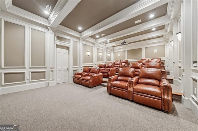 carpeted cinema room featuring visible vents, a decorative wall, beamed ceiling, ornamental molding, and recessed lighting