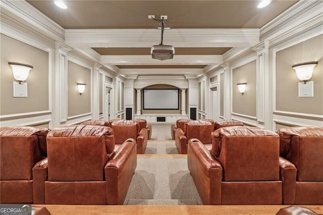 cinema with beam ceiling, a decorative wall, and crown molding