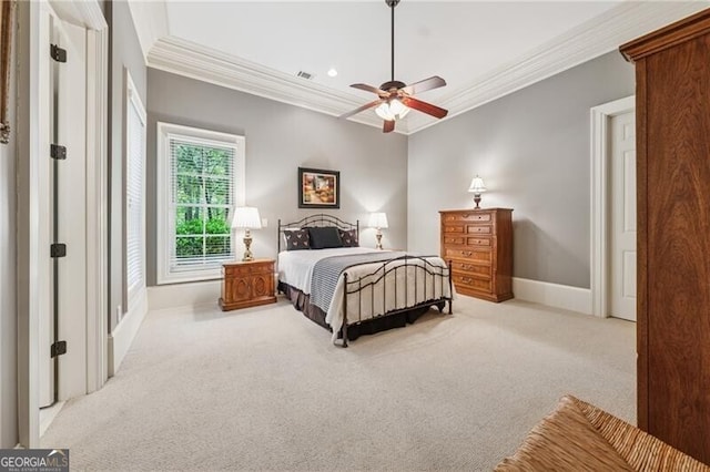 bedroom with carpet, visible vents, crown molding, ceiling fan, and baseboards