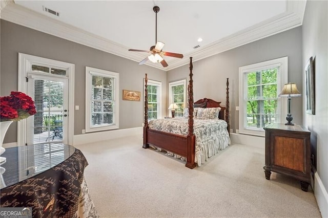 carpeted bedroom featuring crown molding, visible vents, access to exterior, and ceiling fan