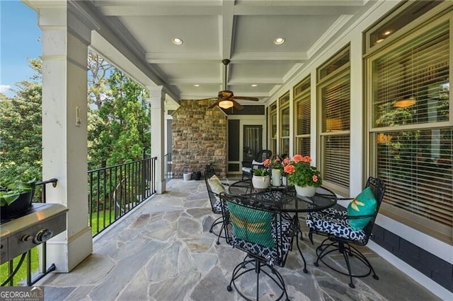 view of patio / terrace with ceiling fan and outdoor dining area