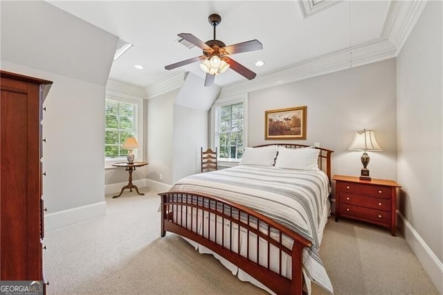 bedroom featuring light colored carpet, attic access, multiple windows, and crown molding