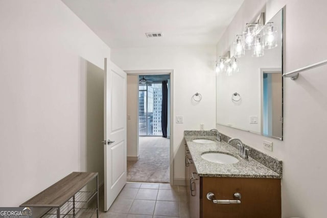 950 W Peachtree St NW Unit 1214, Atlanta, GA 30309 - full bathroom with a sink, double vanity, visible vents, and tile patterned floors