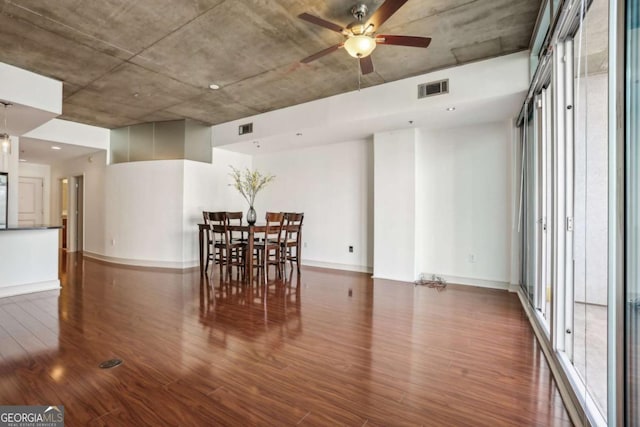 950 W Peachtree St NW Unit 1214, Atlanta, GA 30309 - dining space with ceiling fan, visible vents, and wood finished floors