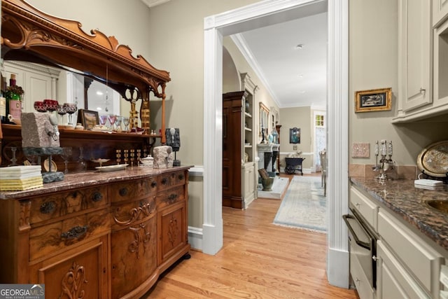 3863 Streamside Dr SE, Marietta, GA 30067 - bar with crown molding, light wood-type flooring, and a warming drawer