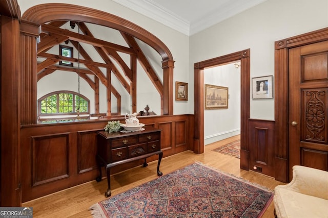 3863 Streamside Dr SE, Marietta, GA 30067 - entrance foyer with a wainscoted wall, wood finished floors, and ornamental molding